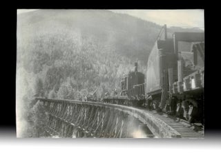 Item #4574 [Kootenay Ghost Town] Photo of Railway Repair Crew Working on Wooden Trestle Bridge at...