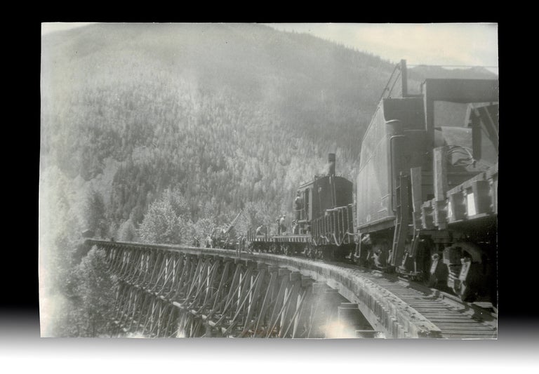 Item #4574 [Kootenay Ghost Town] Photo of Railway Repair Crew Working on Wooden Trestle Bridge at Retallack, BC in 1957. Unknown Photographer.